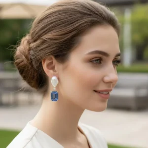 עגילים א-סימטריים זירקון כחול ופנינה